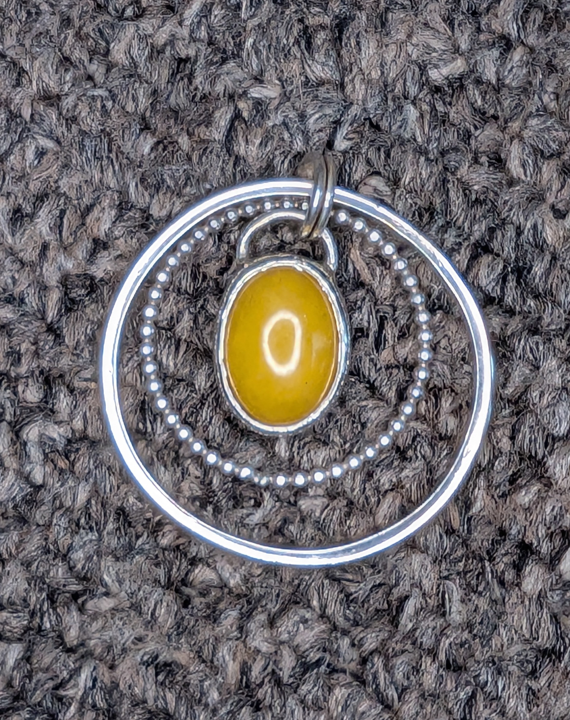 Yellow Onyx & .925 Sterling Silver Pendant - Closed Back Artisan Design with added ring details.